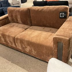 New rustic color fabric upholstered stationary Sofa by Studio Living.