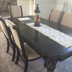 dining table with chairs and buffet table with mirror 