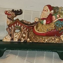 Vintage Cast Iron Santa in Sleigh Mantle Stocking Holder