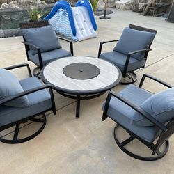 4 Chairs And Fire Pit 