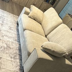 Beige Love Seat Less than 1 year old