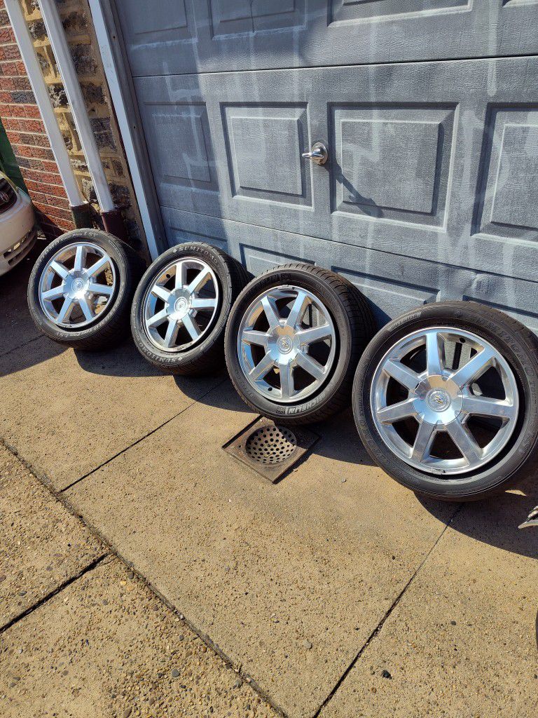17" factory polished cadillac wheels