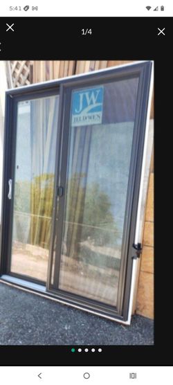 60x80 sliding door new construction,dark brown outside white inside jelwend brand,left hand available now
