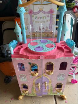 KidKraft Disney Princess Castle Dollhouse – Large Wooden Dollhouse with Furniture