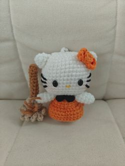 Crocheted Hello Kitty with broom