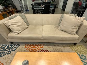 Ivory sofa and matching loveseat