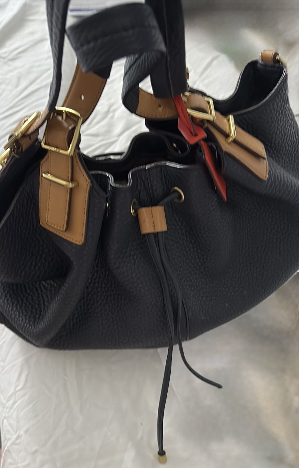 Coach Black and Tan Hobo Bag with Gold Accents