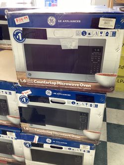 GE Appliances 1.6 Cu Ft Countertop Microwave Oven