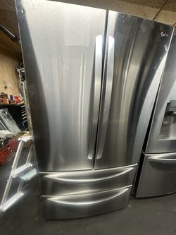 LG 4 Door Stainless Steel Refrigerator Works Great 
