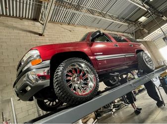 Chevy Tahoe Yukon wheels tires leveling & Lift kits accessories Lights installations. (We Finance)