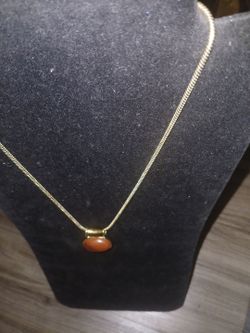 Gold necklace with differnt color stones