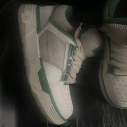 Amiri Green & white sneakers missing the m on the side 