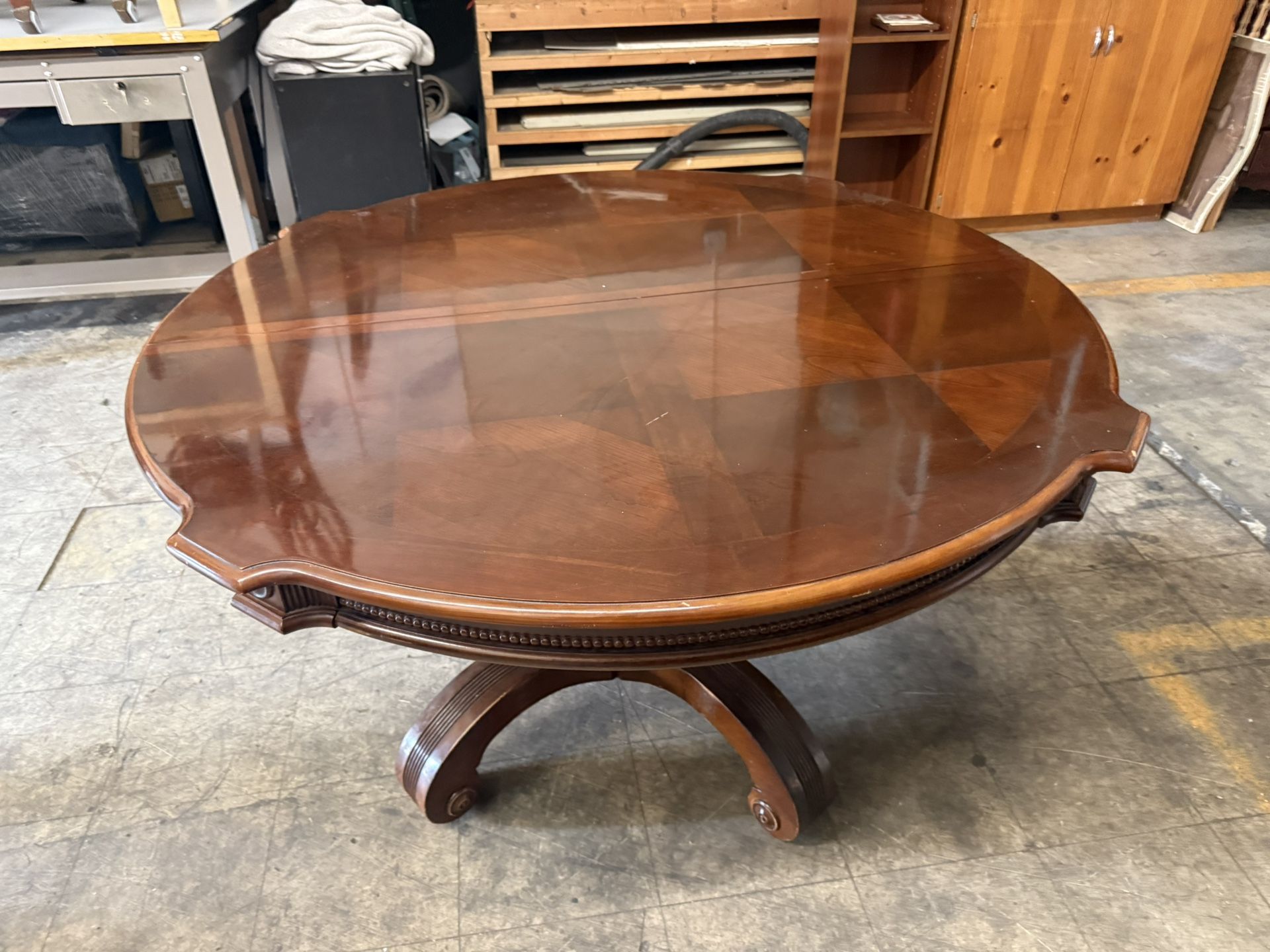 Beautiful, Solid Wood Dining Table With Pedestal Base And One Leaf