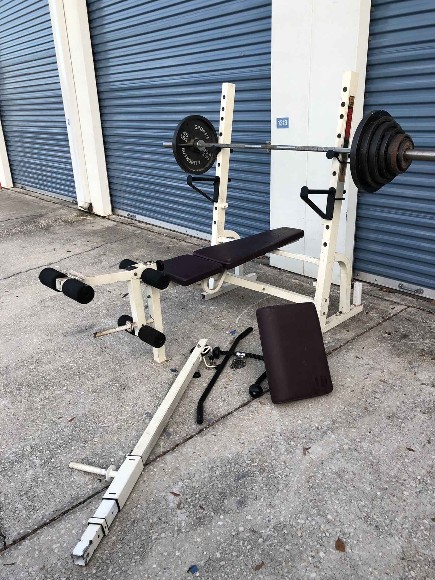 Olympic weight bench with 255 pound weight stack