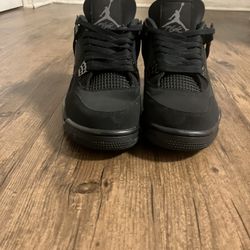 Black Cat Jordan 4’s