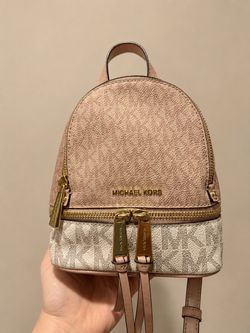 The Michael Kors Rhea Mini Color-Block Logo Backpack Purse Bag