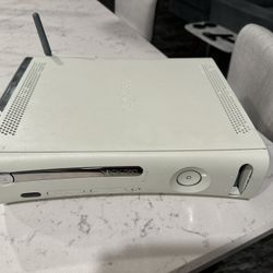 Xbox 360 Console, Wireless Adapter, and Three Wireless Controllers