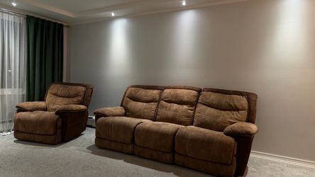 Reclining sofa and recliner chair - $170
