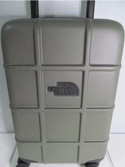 The north face carry on spinner  green