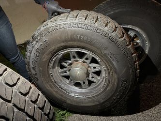 Two 33” Gladiator Tires With 16” Rims