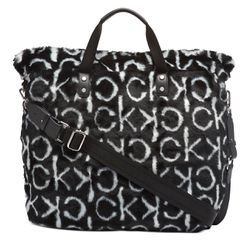Cozy up to Calvin Klein's Elise tote, featuring a soft, inviting exterior and subtle logo detail at front.