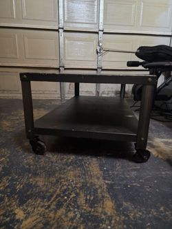 Metal table with wheels