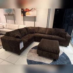 Brown Jumbo corduroy sectional sofa with ottoman Living room couch