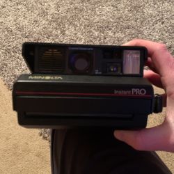Minolta Instant Pro Polaroid Camera