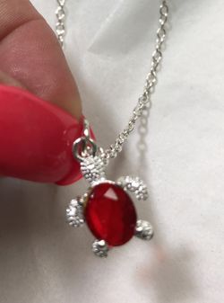 Silver and red turtle necklace