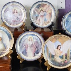 8 Angel Collectible Plates, & stands, $125
