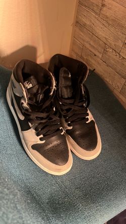 Black and grey Jordan 1s
