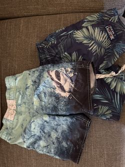 Size 6-7 Swim trunks Set of 2 For $5