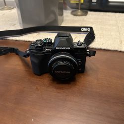 Olympus OMD EM10 Mark IV Bundle (2 Lens, Tripod, Case)