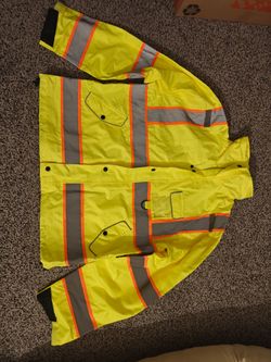 Impermeable y chaleco de trabajo