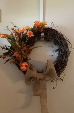 Beautiful fall wreath with orange flowers and burlap bow...reduced to $25
