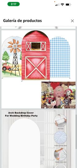 cubierta de arco con temática de granja presenta un molino de viento de dibujos animados y un tractor rojo, ideal para decoraciones de fiestas.El mate