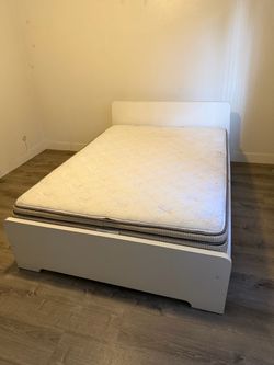 Full sized mattress and bed frame