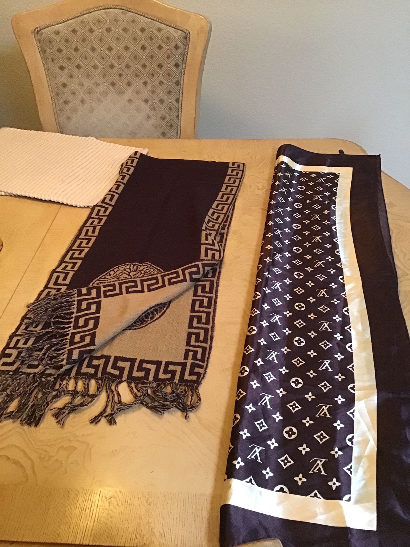 Versace scarf and silk Louis Vuitton scarf selling them for $140 each make a perfect last minute gift