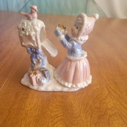 Vintage Girl Sending Christmas Gift Figurine