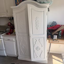 Large vintage armoir, used as kitchen pantry