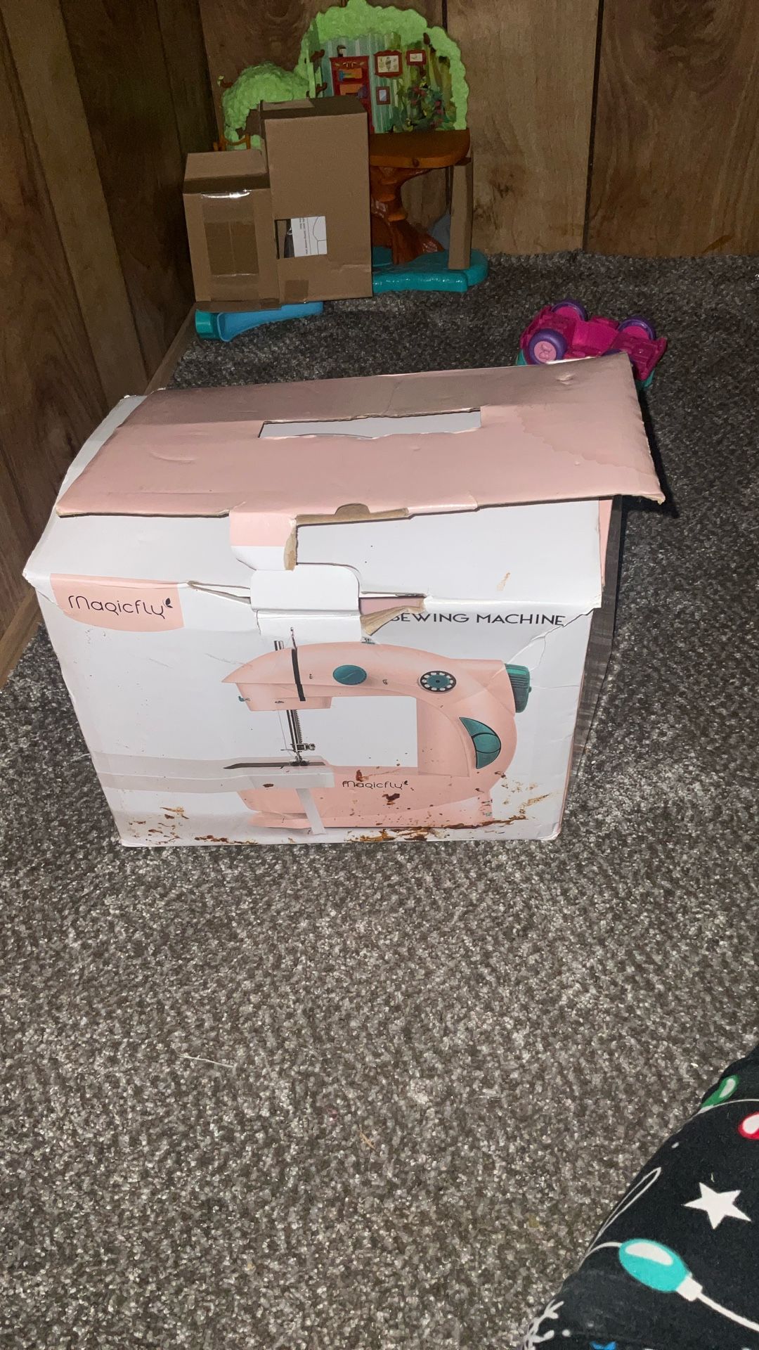New in the box box does have opening and some tears, but it has never been taken out of the box sewing machine
