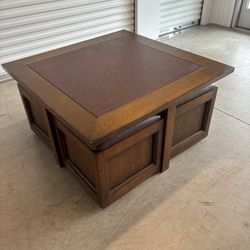 Solid Oak Game Table/Coffee Table With Four Storage Seats With Casters. 