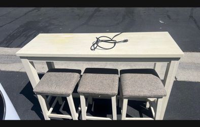 Table with bar stools