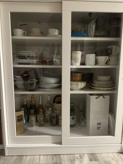 Ikea syvde cabinet with glass doors deals
