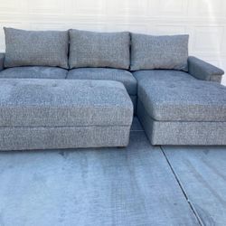 New Sectional With Ottoman By Ashley 