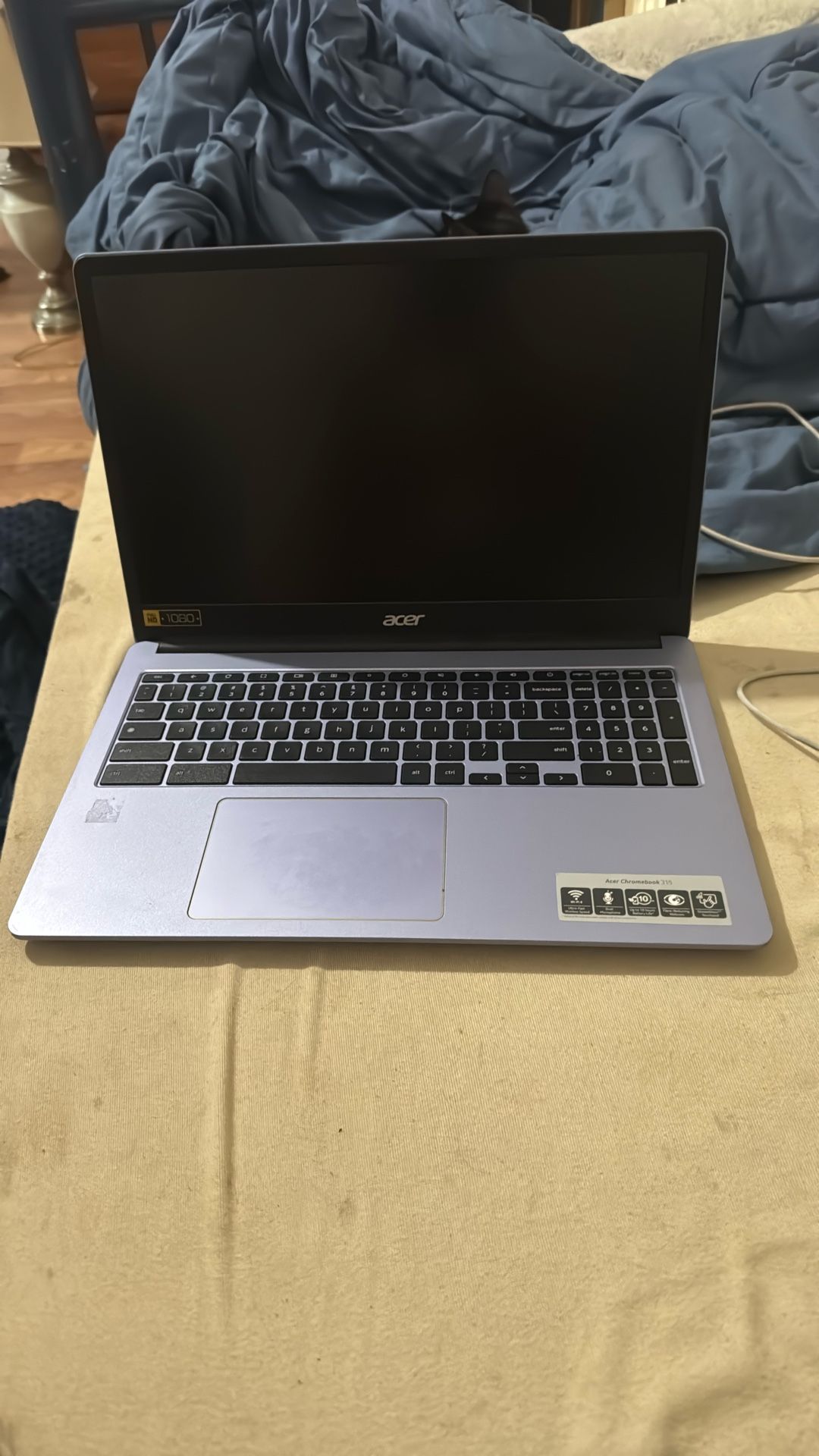 Works perfectly fine and comes with the case and charger
