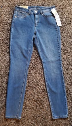Michael Kors  new with tag mid-rise skinny stretchy jeans size 4