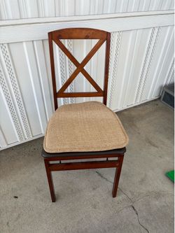 Wooden folding chair.