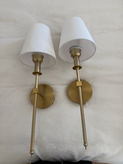 Gold light sconces