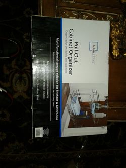Pull out cabinet organizer